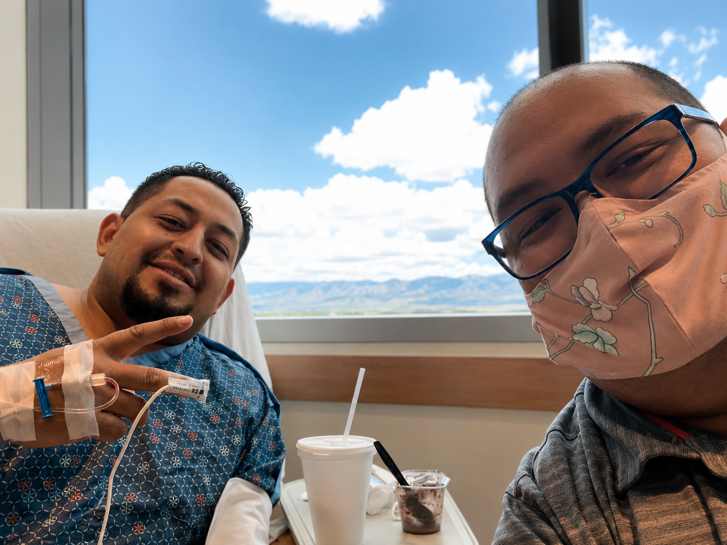 Allan's brother in a hospital bed preparing for stem cell donation with Allan beside him